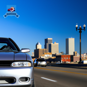An image of a sleek silver car driving down the busy streets of Sioux Falls, South Dakota, with the city skyline in the background and a clear blue sky above