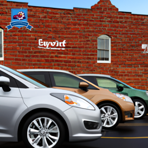 An image of a row of sleek, modern cars parked in front of a charming brick building in Simpsonville, South Carolina