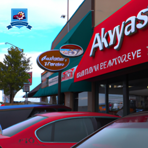 An image of a bustling downtown street in Puyallup, Washington, with various car insurance company logos displayed on storefronts