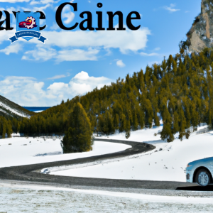An image of a snowy mountainous landscape in West Yellowstone, Montana, with a car driving on a winding road
