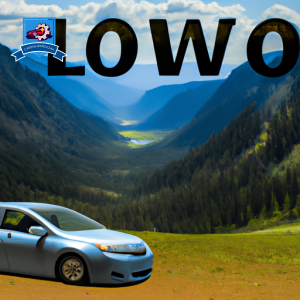 An image of a car driving through the scenic Blue Mountains in La Grande, Oregon with a visible license plate reading "LOWINS" to represent cheap auto insurance in the area