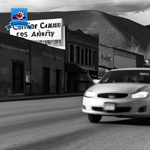 An image of a silver sedan driving through the picturesque streets of Anaconda, Montana